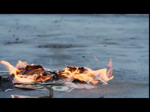 Still from Burning Money — Pile o’ Cash